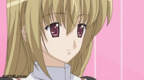 A Close Up Of A Blonde Anime Girl With Red Eyes On A Pink Background GIF