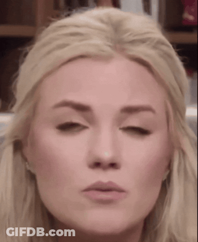 A Close Up Of A Blonde Woman Making A Funny Face GIF