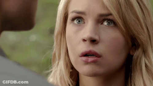 Blonde Woman With Blue Eyes Close Up GIF
