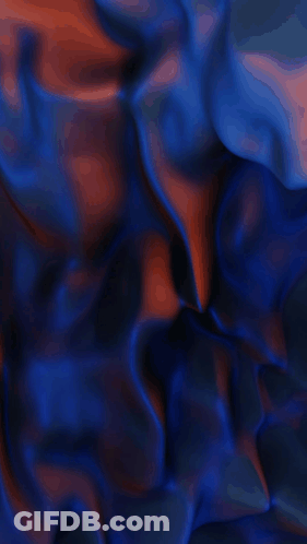 A Close Up Of A Blue And Orange Colored Cloth GIF