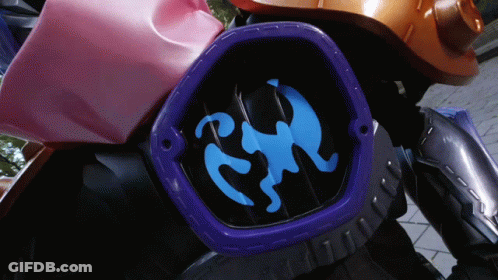 A Close Up Of A Blue And Purple Item With A Monkey On It GIF