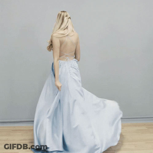 A Close Up Of A Blue And White Lace Fabric With Gino Cornell Written On The Bottom GIF