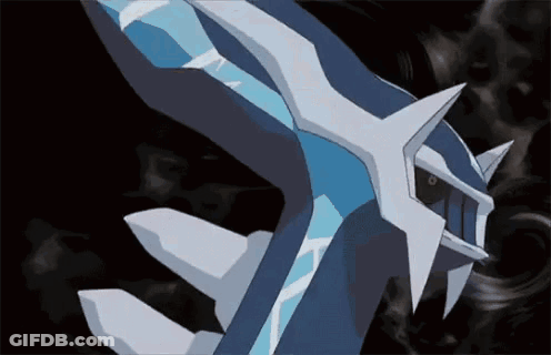A Close Up Of A Blue And White Pokemon With A Black Background GIF