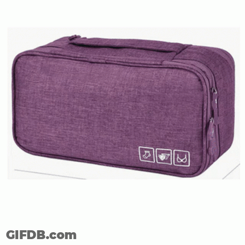 A Close Up Of A Blue Bag With Flowers On It GIF