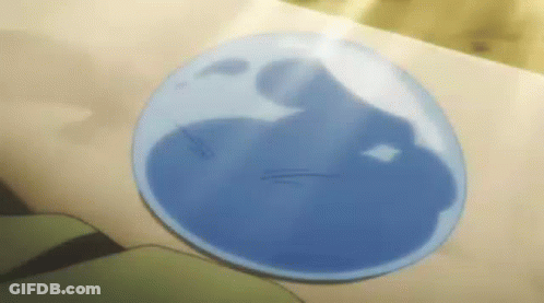 A Close Up Of A Blue Bubble On A Person 'S Hand . GIF