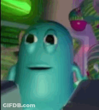 A Close Up Of A Blue Cartoon Character With Big Eyes And A Smile On His Face . GIF
