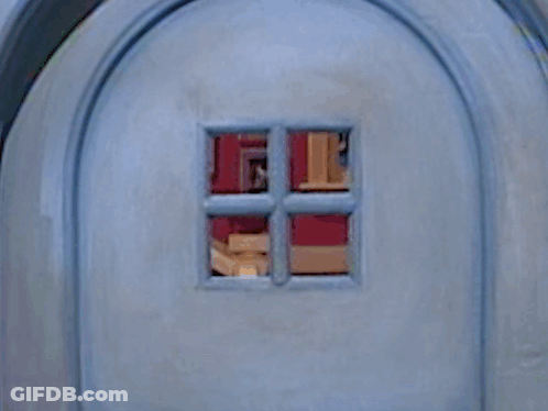 A Close Up Of A Blue Door With A Window In It GIF
