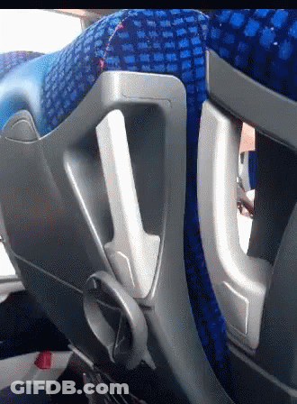 A Close Up Of A Blue Seat With A Handle GIF