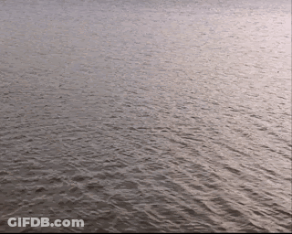 A Close Up Of A Body Of Water Shows The Waves GIF