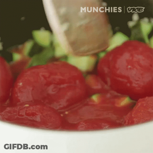 A Close Up Of A Bowl Of Tomatoes With The Words Munchies Vice Written On The Bottom GIF