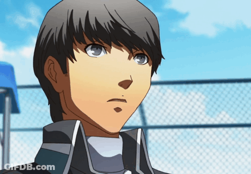 A Close Up Of A Boy 'S Face With A Fence In The Background GIF