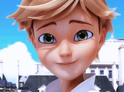 A Close Up Of A Boy 'S Face With Green Eyes GIF