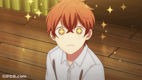 A Close Up Of A Boy 'S Face With His Eyes Shining Brightly GIF