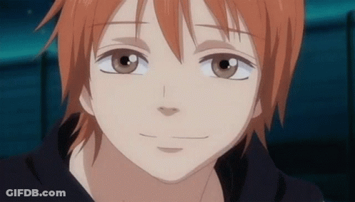 Close Up Of Boy's Face With Red Hair And Brown Eyes GIF