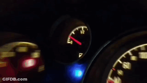 A Close Up Of A Car Dashboard With The Speedometer Displaying 220 GIF