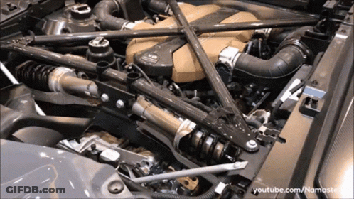 A Close Up Of A Car Engine With Youtube.com/namaste In The Lower Right Corner GIF