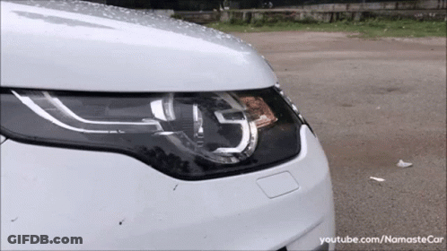 A Close Up Of A Car 'S Headlight With Youtube.com/namastecar Written On The Bottom GIF