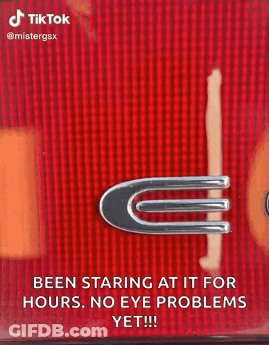 Close Up Of Car Tail Light With Staring At It Text GIF