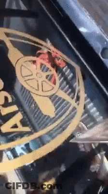 A Close Up Of A Car With A Logo That Says Arsenal On It GIF