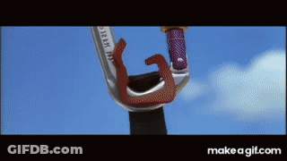 A Close Up Of A Carabiner With A Blue Sky In The Background .. GIF