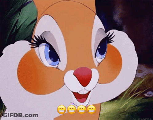 A Close Up Of A Cartoon Bunny With Four Smiley Faces On It GIF