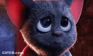 A Close Up Of A Cartoon Cat With Big Blue Eyes And Red Ears . GIF