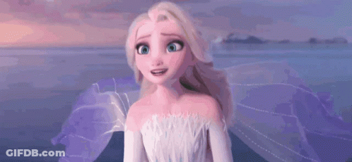 A Close Up Of A Cartoon Character From The Movie Frozen Ii Standing In Front Of A Body Of Water . GIF
