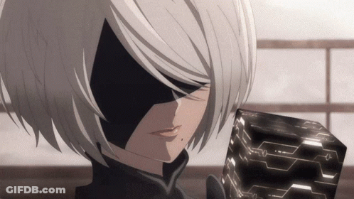 A Close Up Of A Cartoon Character Holding A Black Cube GIF