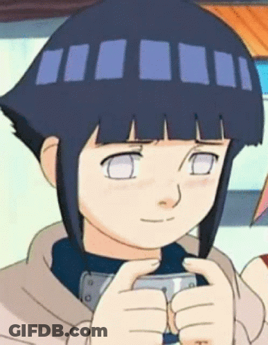 A Close Up Of A Cartoon Character Holding A Cell Phone In Her Hand . GIF