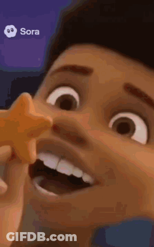 Cartoon Character Holding Starfish In Mouth GIF