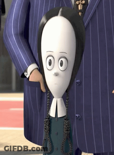 A Close Up Of A Cartoon Character In A Blue Suit GIF