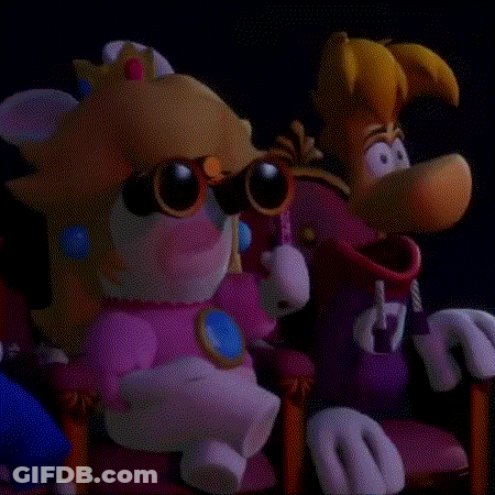 A Close Up Of A Cartoon Character , Peach , And Rayman , Standing Next To Each Other . GIF
