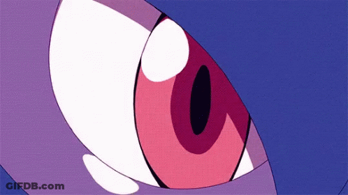 A Close Up Of A Cartoon Character 'S Eye With A Pink Pupil . GIF