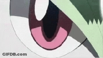 A Close Up Of A Cartoon Character 'S Eye With A Pink Ring Around It . GIF