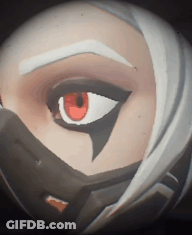 A Close Up Of A Cartoon Character 'S Eye With A Red Pupil GIF