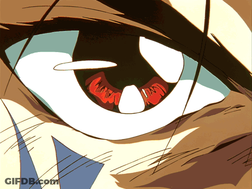 A Close Up Of A Cartoon Character 'S Eye With A Red Pupil GIF