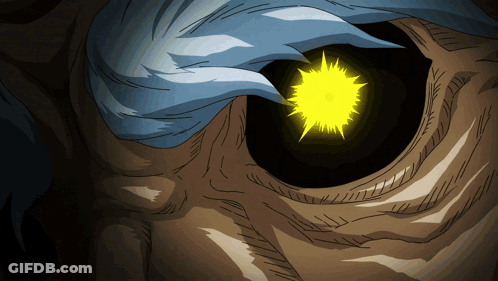 A Close Up Of A Cartoon Character 'S Eye With A Yellow Glow GIF