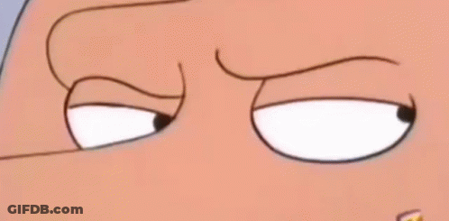 A Close Up Of A Cartoon Character 'S Eyes With A Slight Smirk On His Face . GIF