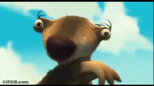 A Close Up Of A Cartoon Character 'S Face Against A Blue Sky GIF