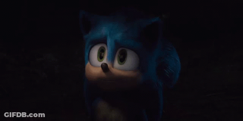 A Close Up Of A Cartoon Character 'S Face In The Dark GIF