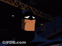 A Close Up Of A Cartoon Character 'S Face With A Crane In The Background GIF
