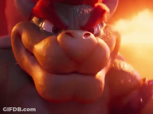 A Close Up Of A Cartoon Character 'S Face With A Fire Background . GIF