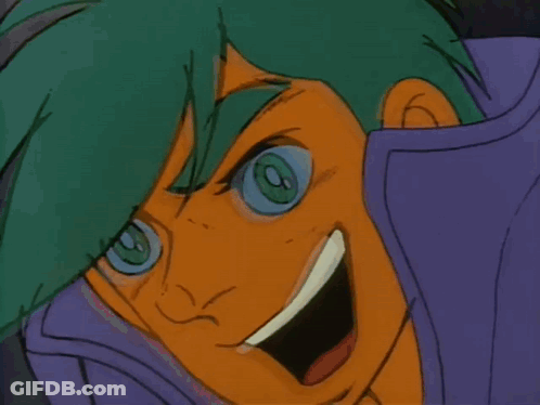 Cartoon Face With Green Eye And Purple Shirt GIF