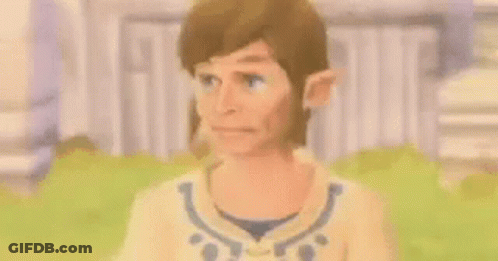 A Close Up Of A Cartoon Character 'S Face With A Green Hair And Ears . GIF