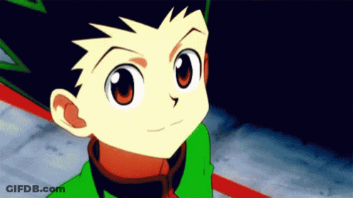 A Close Up Of A Cartoon Character 'S Face With A Green Shirt And Red Collar . GIF