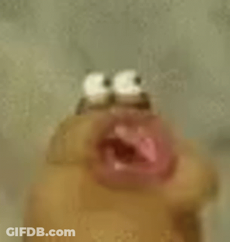 A Close Up Of A Cartoon Character 'S Face With A Mouth Open . GIF