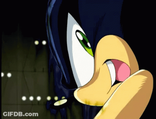 A Close Up Of A Cartoon Character 'S Face With A Pink Tongue Sticking Out GIF
