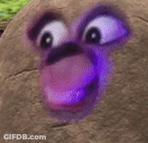 A Close Up Of A Cartoon Character 'S Face With A Purple Eye . GIF