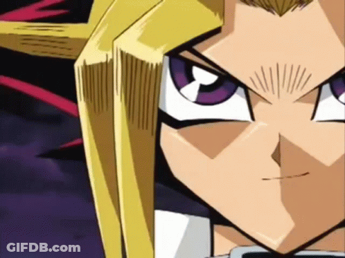 A Close Up Of A Cartoon Character 'S Face With A Purple Eye . GIF