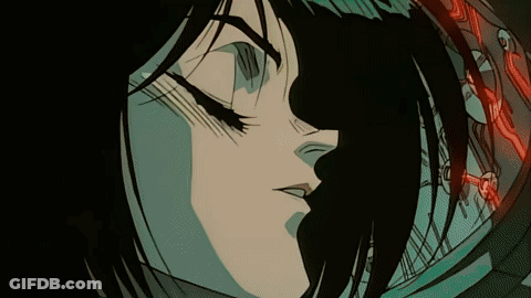A Close Up Of A Cartoon Character 'S Face With A Red Light Behind Her GIF